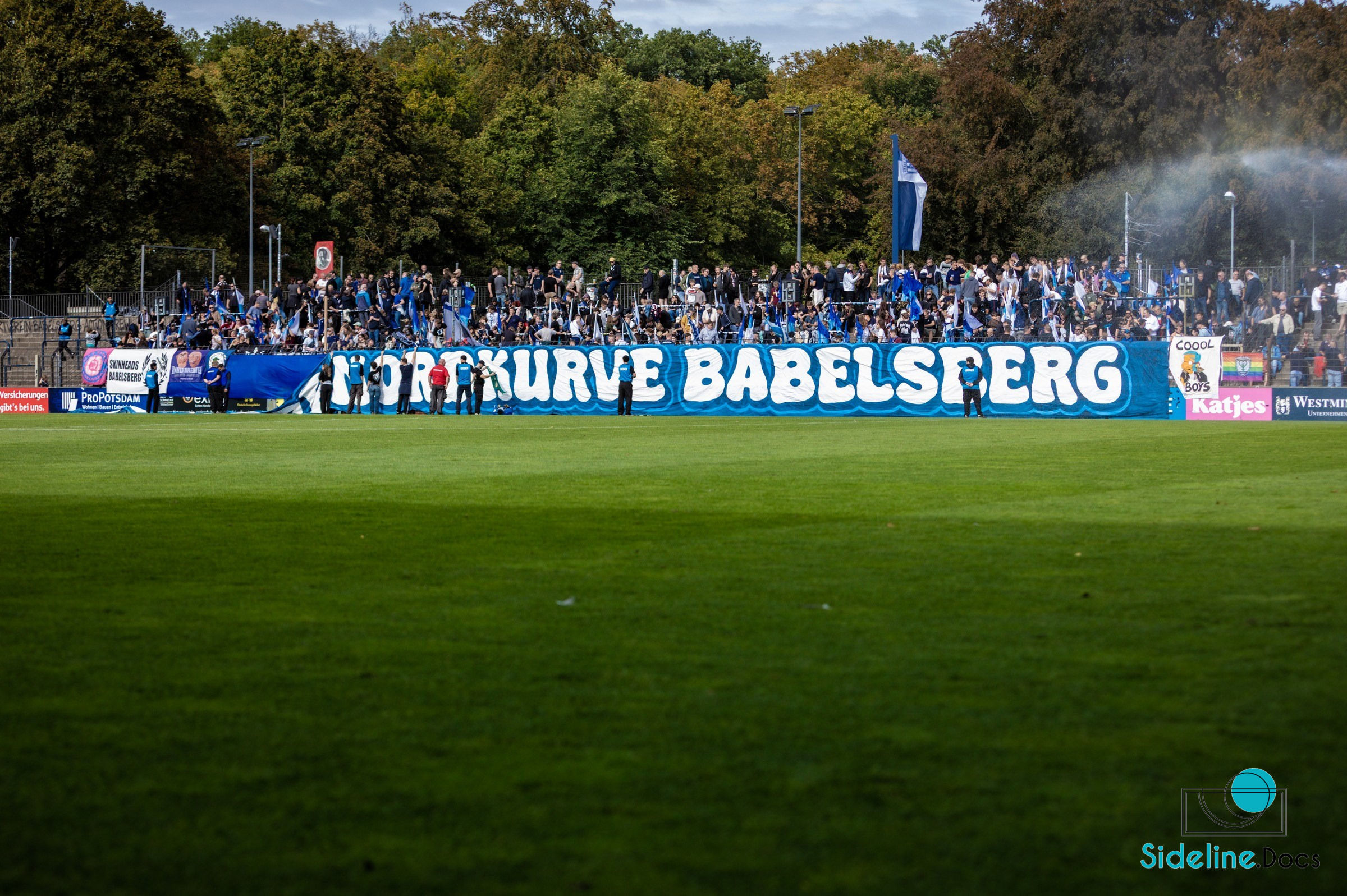 North stand raising the anniversary banner
