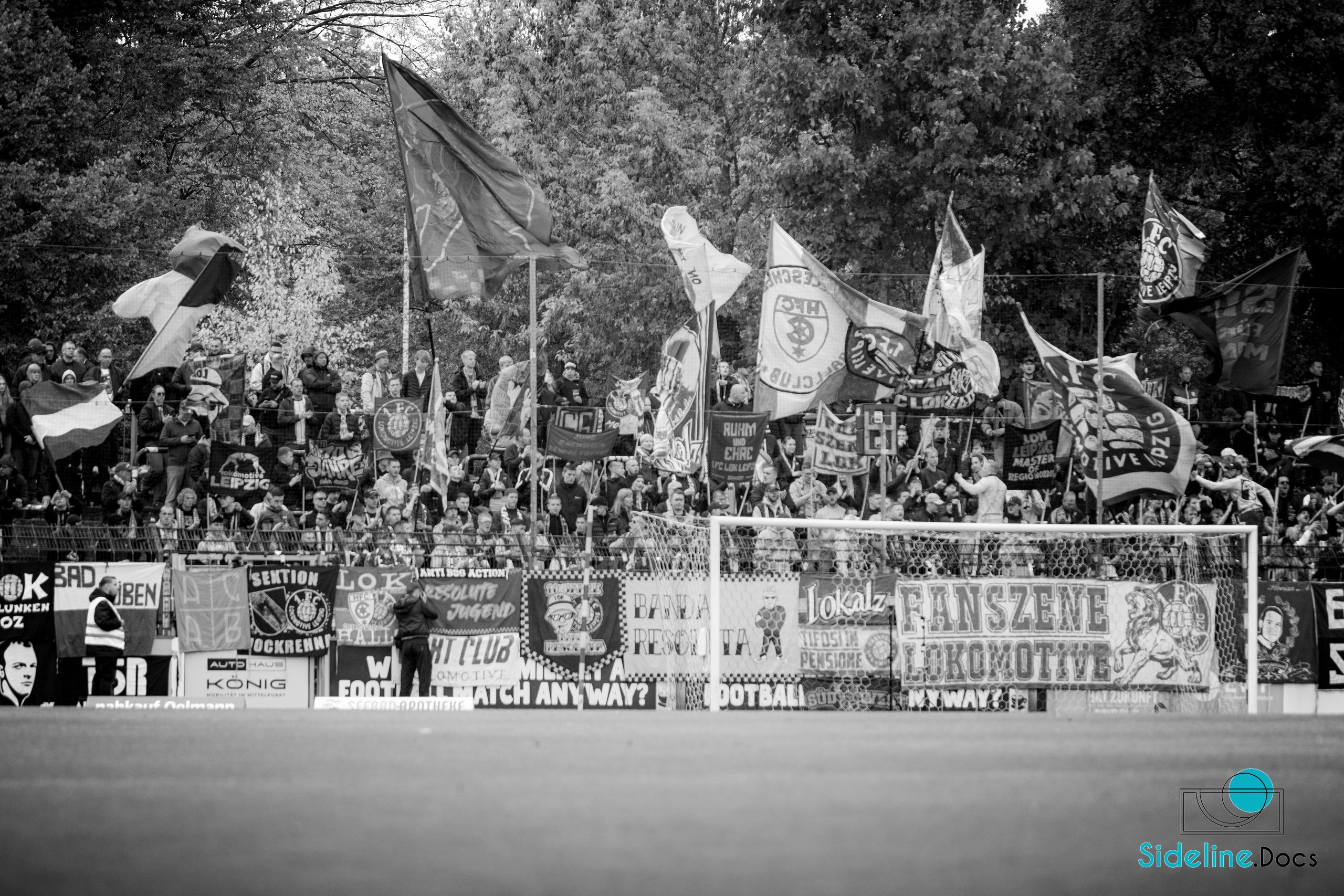 Away end behind the goal, Lok Leipzig flags and Fanszene banners