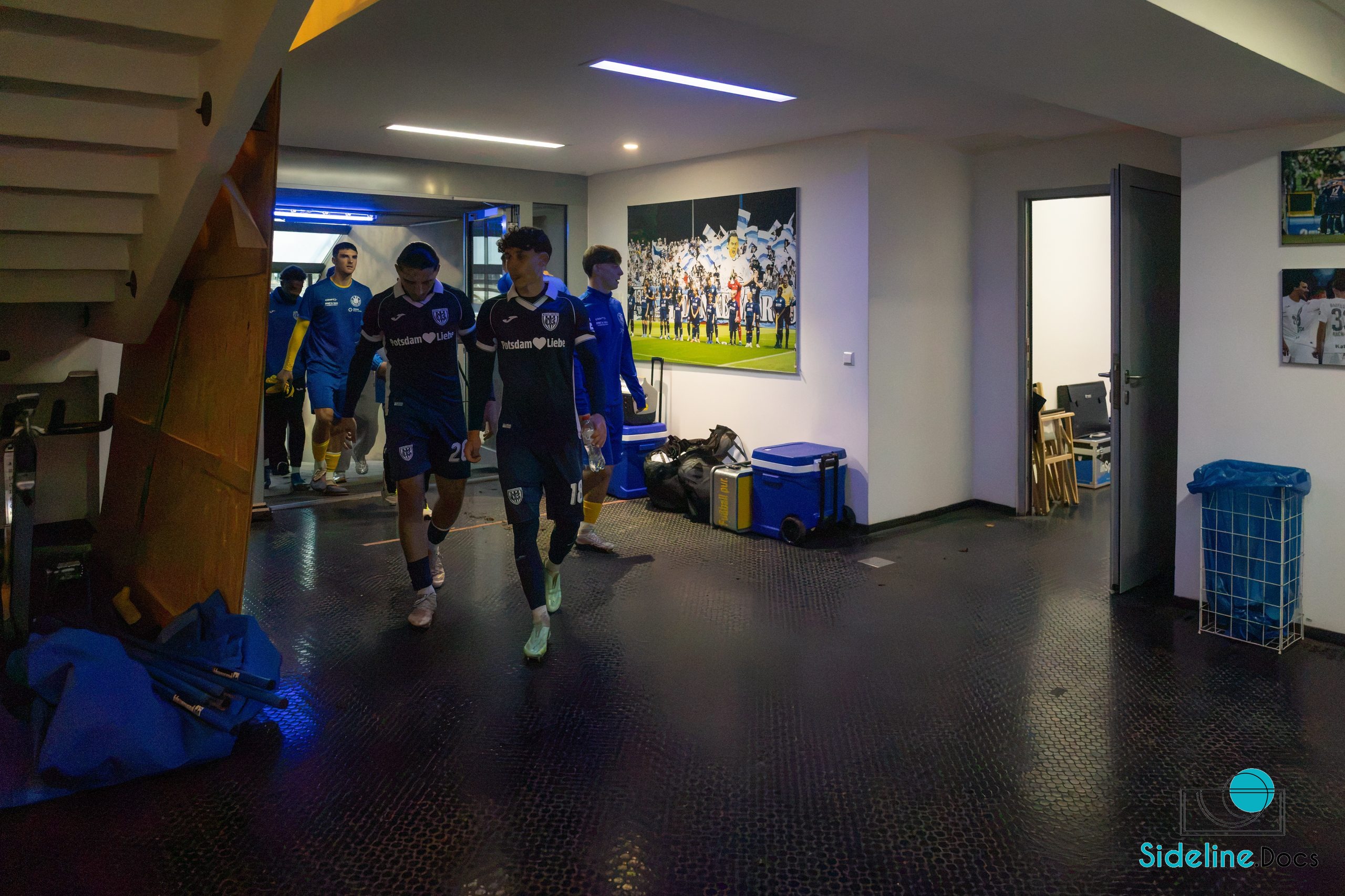 Players in the tunnel area after the match